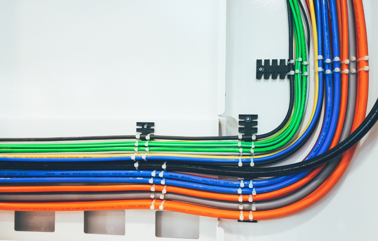 Electrician calculating the cost of rewiring a house in Ireland