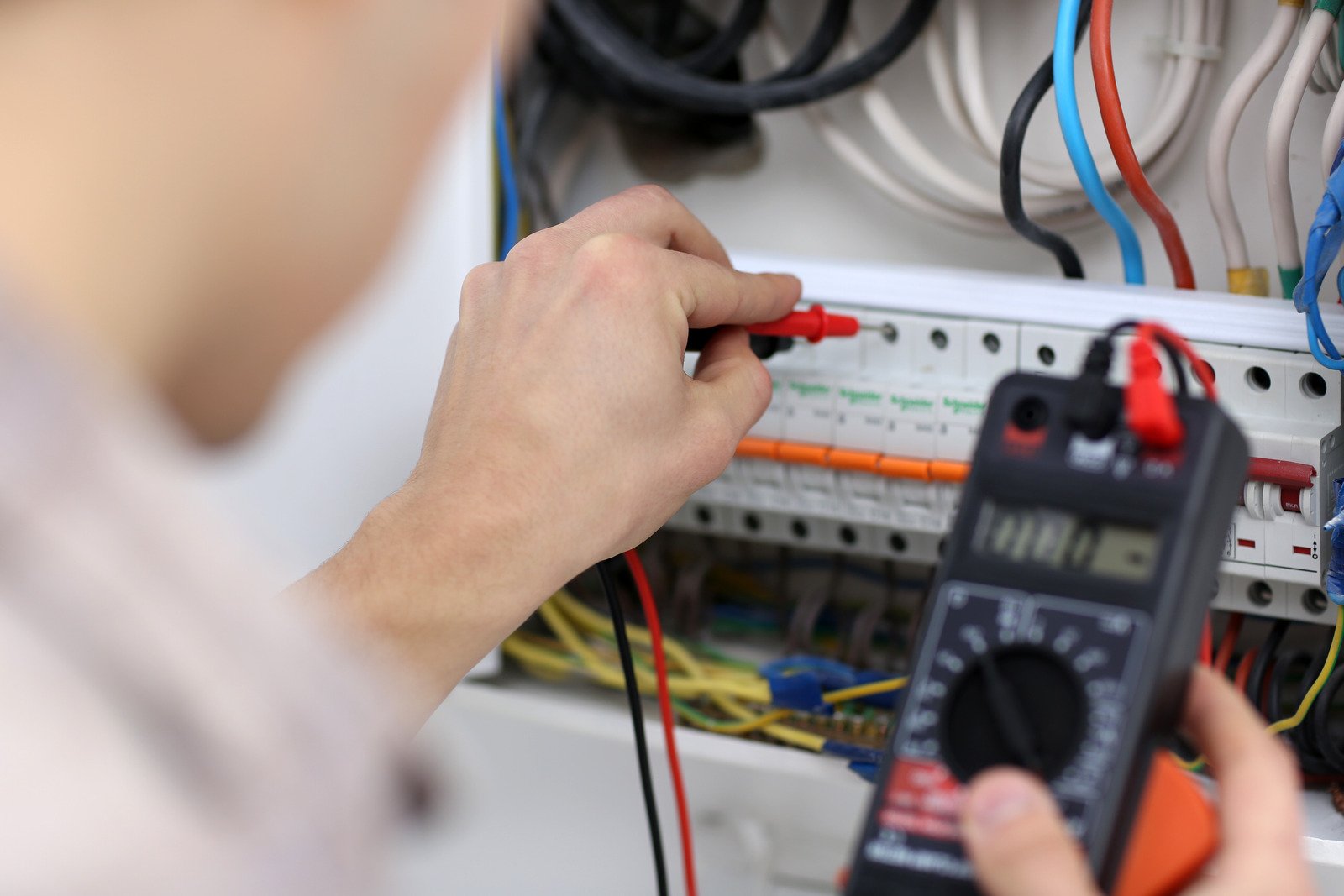 Electrician rewiring an Irish house fuse board